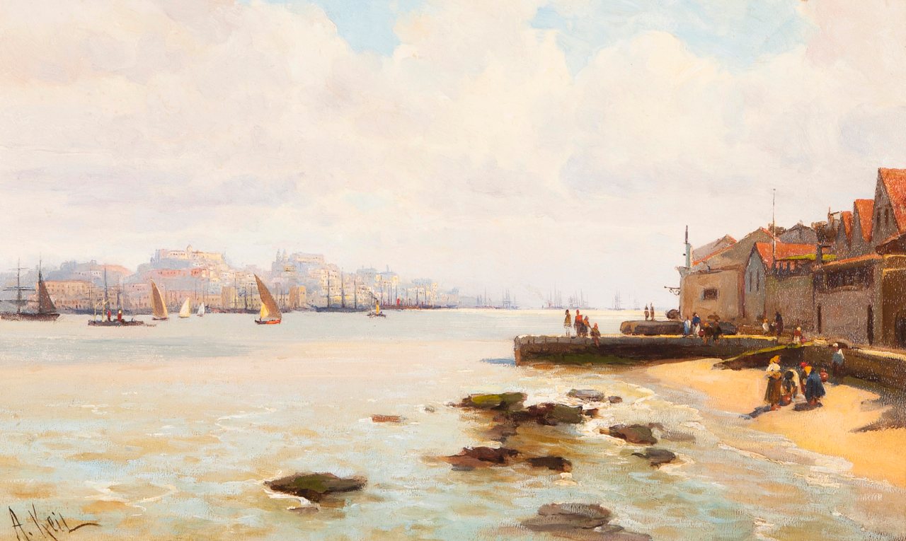 Lisbon's hillside skyline and sailing boats seen across the Tagus from the Ginjal quay, with a stone pier, red-roofed warehouses and figures on the beach at right.